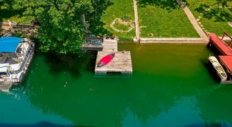 Homes for Sale in Lake Waukomis, MO 64151 | 376 NW North Shore Drive