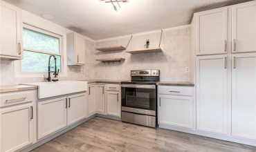 Homes for Sale in Kansas City, MO 64151 | 5018 NW Huonker Road