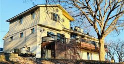 Homes for Sale in Lake Waukomis, MO 64151 | 715 NW South Shore Drive